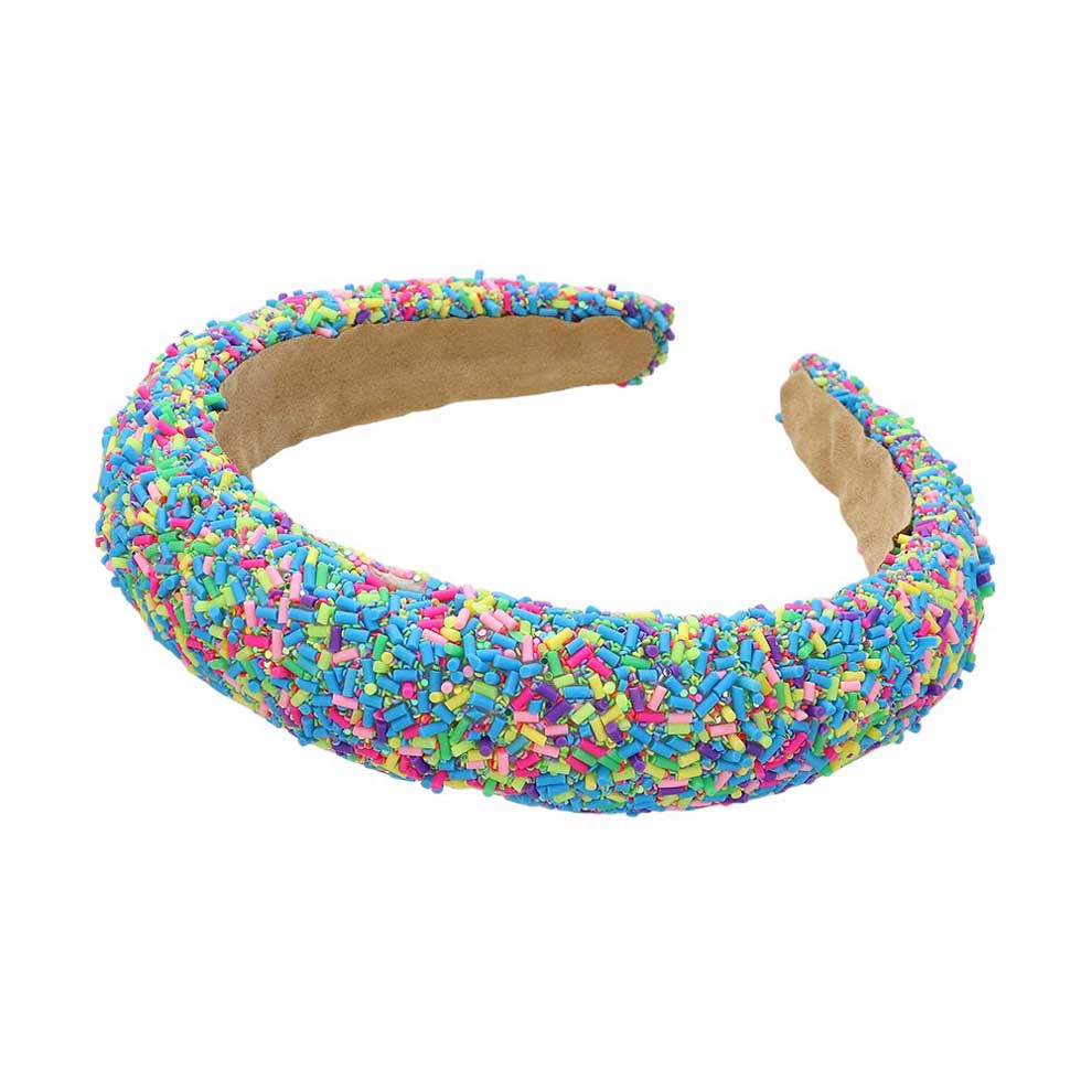 Aqua Sprinkle Beaded Headband. Upgrade your hair accessory game with our headband with the perfect blend of style and functionality, this headband adds a touch of elegance to any outfit. Made with precision and quality materials, it will elevate your look and keep your hair in place all day long.
