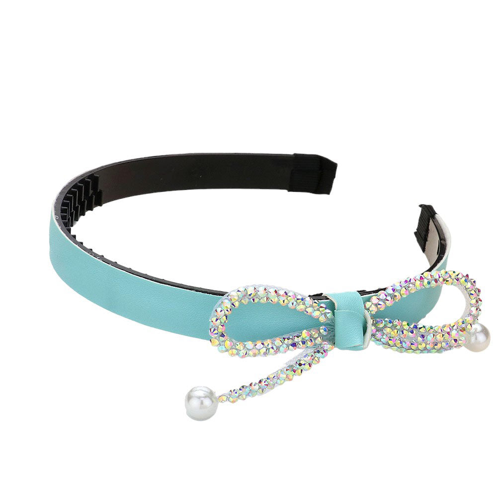 Blue Bling Studded Pearl Tip Bow Accented Headband, this is a luxurious and stylish accessory that adds a touch of elegance to any outfit. The studded pearls and bow design create a classic and sophisticated look, perfect for formal events or adding a touch of glamour to your everyday style.