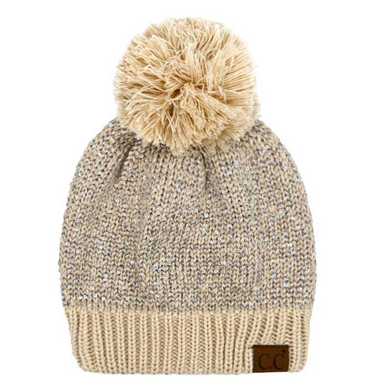 C.C Sequin Cuff Pom Pom Beanie Hat, Stay warm and stylish even during the coldest days with this. This hat is made with durable materials for long-lasting comfort and features a cozy and fashionable pom pom on the top. The added sequin cuff adds a glamorous touch to the classic beanie style. Perfect winter gift idea.