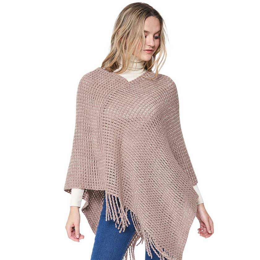 Beige Fringed Solid Knit Poncho, with the latest trend in ladies' outfit cover-up! the high-quality knit poncho is soft, comfortable, and warm but lightweight. It's perfect for your daily, casual, party, vacation, and other special events outfits. A fantastic gift for your friends or family.