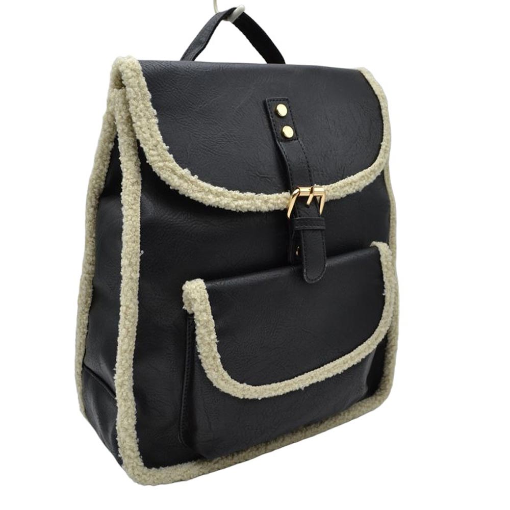 Black Faux Shearling Trimmed Vegan Leather Foldover Backpack. This stylish bag features an elegant faux shearling trim and a back pocket for extra versatility. The faux shearling trim provides a pleasant and luxurious feel to the bag. It is perfect for carrying your daily essentials, from books to work essentials.