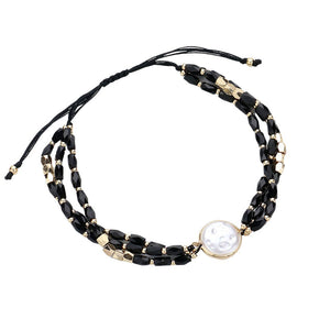 Black Pearl Pointed Faceted Beaded Pull Tie Cinch Bracelet, Indulge in luxury with our dazzling and elegant bracelet features beautifully crafted pearls and faceted beads, all perfectly strung together for a stunning piece that will elevate any outfit. With its adjustable pull tie cinch, you can achieve the perfect fit.