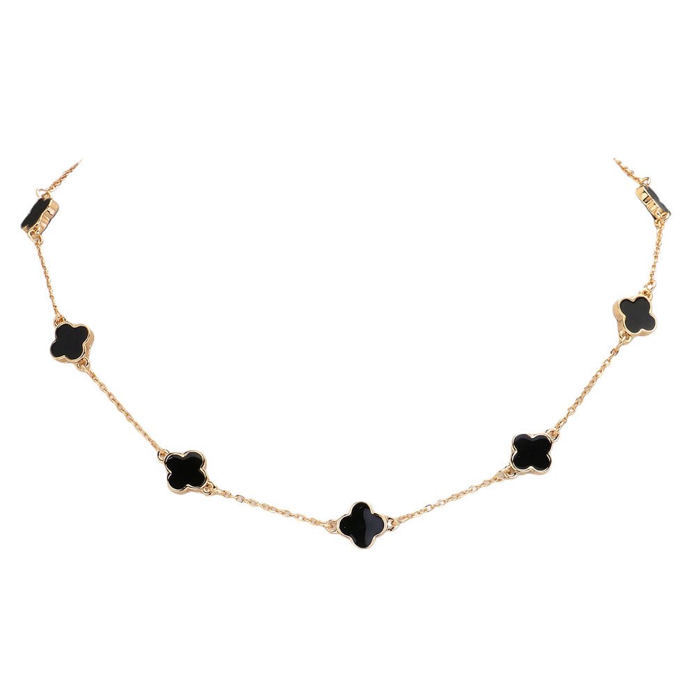 Black Quatrefoil Station Necklace is a sophisticated and timeless piece to elevate any outfit. Crafted with our unique quatrefoil design, this necklace is perfect for everyday wear or special occasions. Made with high-quality materials, it's a must-have staple for any jewelry collection.