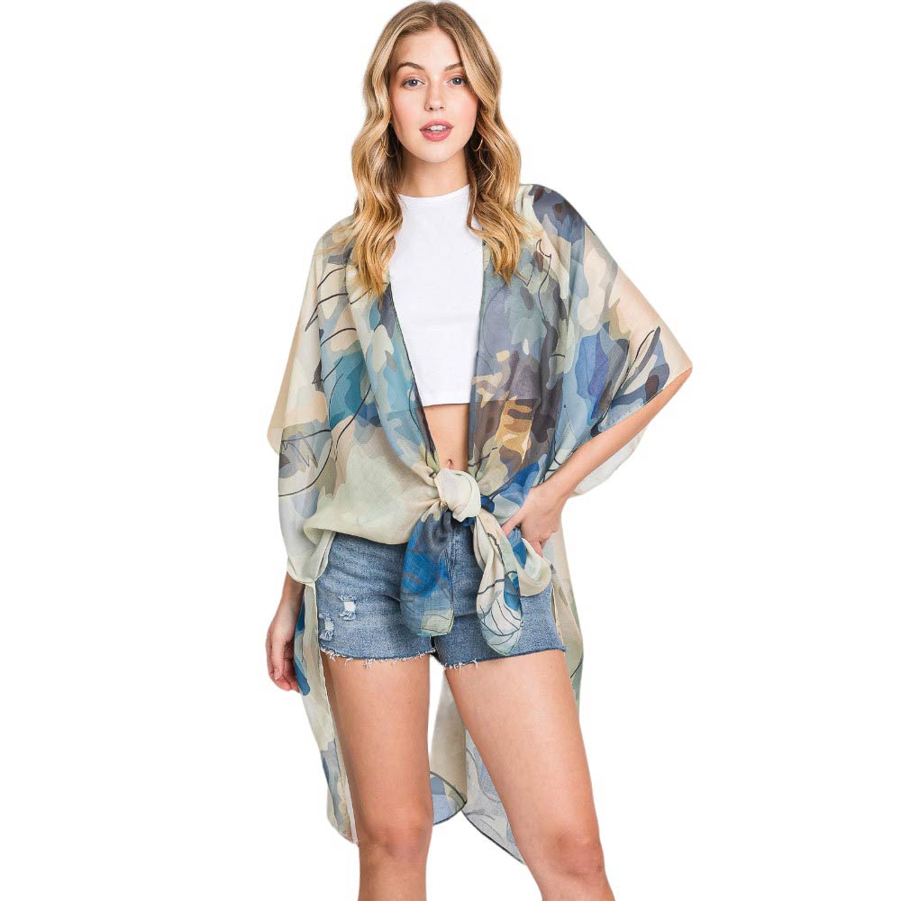 Blue Abstract Watercolor Leaves Print Kimono Poncho adds a touch of elegance to any outfit with its unique and modern print design. Made from high-quality materials, this versatile poncho provides both style and comfort. Perfect for any occasion, this kimono poncho is a must-have for any fashion-forward individual.