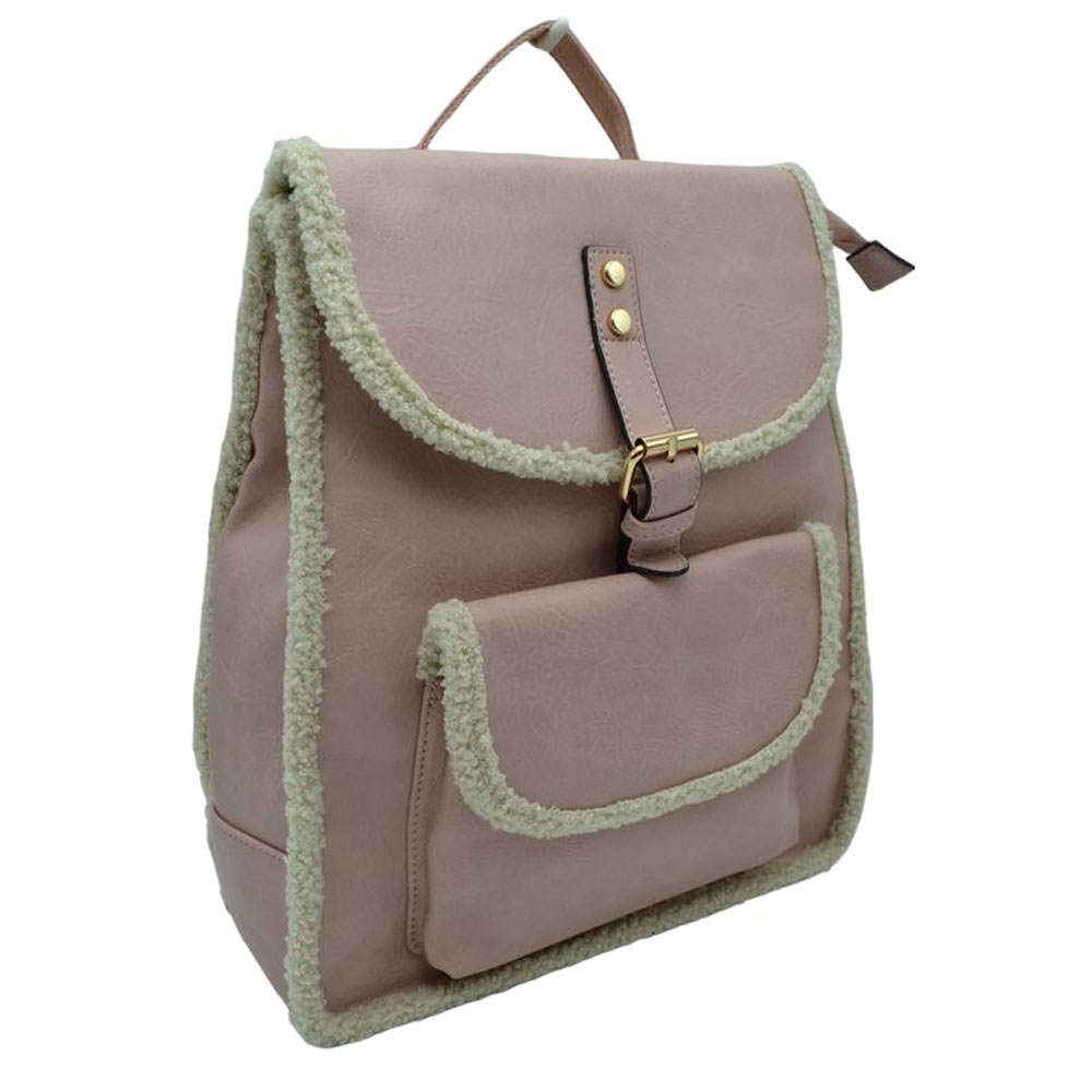 Blush Faux Shearling Trimmed Vegan Leather Foldover Backpack. This stylish bag features an elegant faux shearling trim and a back pocket for extra versatility. The faux shearling trim provides a pleasant and luxurious feel to the bag. It is perfect for carrying your daily essentials, from books to work essentials.