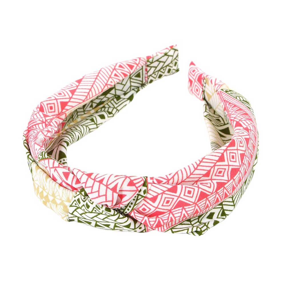 Coral Aztec Patterned Burnout Knot Headband is expertly crafted and features a unique design. Its trendy Aztec pattern and comfortable knot design are perfect for adding a touch of style to any outfit. Made with high-quality materials, it provides both functionality and fashion.