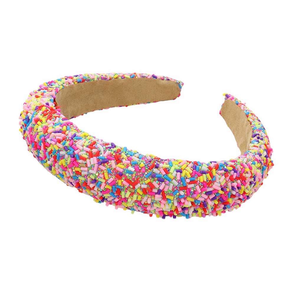 Coral Sprinkle Beaded Headband. Upgrade your hair accessory game with our headband with the perfect blend of style and functionality, this headband adds a touch of elegance to any outfit. Made with precision and quality materials, it will elevate your look and keep your hair in place all day long.