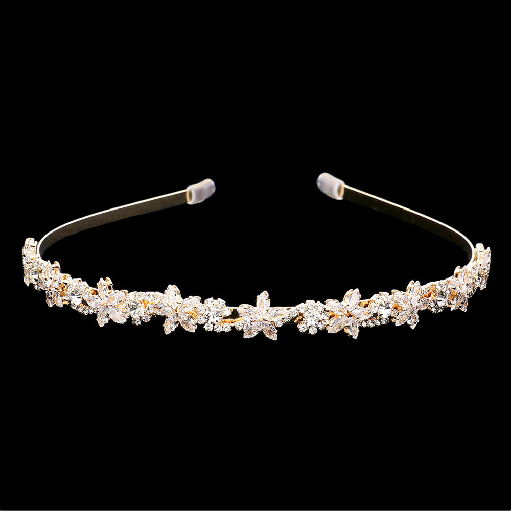 AB Silver CZ Flower Cluster Headband features sparkling CZ flowers that add a touch of elegance to any hairstyle. The headband is perfect for weddings, parties, or any special occasion. Crafted with meticulous attention to detail, this headband is sure to make a statement. Elevate your look with the CZ Flower Cluster Headband.