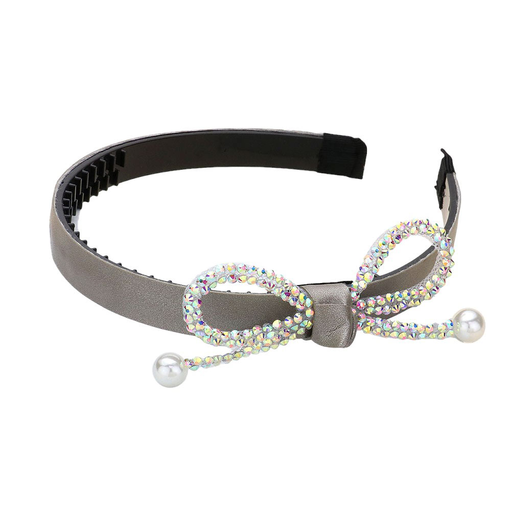 Gray Bling Studded Pearl Tip Bow Accented Headband, this is a luxurious and stylish accessory that adds a touch of elegance to any outfit. The studded pearls and bow design create a classic and sophisticated look, perfect for formal events or adding a touch of glamour to your everyday style.