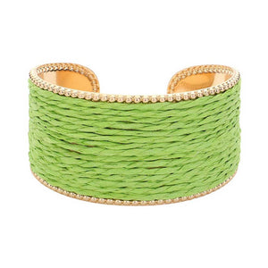 Green Raffia Cuff Bracelet, Introducing a unique addition to your jewelry collection. Made from versatile raffia, this cuff offers a touch of natural elegance to any outfit. Its lightweight design ensures all-day comfort. Perfect for giving a lovely gift to someone you love and care about. Elevate your style with this.