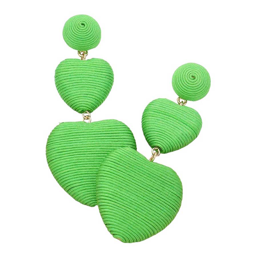 Green Thread Wrapped Double Heart Dropdown Earrings are a versatile and stylish addition to any jewelry collection. The unique design features two intertwined hearts, symbolizing love and unity. Crafted with high-quality materials, these earrings are lightweight and comfortable to wear. Perfect for any occasion or daily wear
