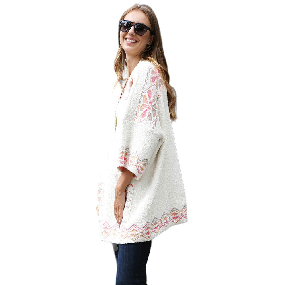 Ivory Floral Geometric Cardigan Poncho, features a unique floral geometric design that's sure to make you stand out in any crowd. Perfect for winter, it'll keep you warm and add a splash of color to your wardrobe. Lightweight and comfortable, it is the perfect addition to any outfit. Perfect winter gift for your loved ones.