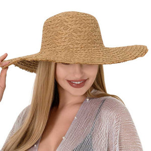 Khaki Frayed Edged Straw Sun Hat. Made from durable straw material with a frayed edge design, this hat not only offers maximum sun protection but also adds a stylish touch to your summer look. Stay cool and fashionable all season long. Perfect for a sunny day outdoor wear, or a sun protection gift for your loved one.