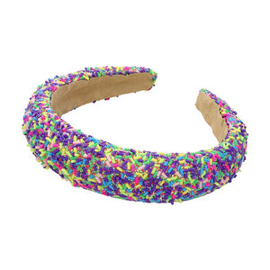 Lavender Sprinkle Beaded Headband. Upgrade your hair accessory game with our headband with the perfect blend of style and functionality, this headband adds a touch of elegance to any outfit. Made with precision and quality materials, it will elevate your look and keep your hair in place all day long.