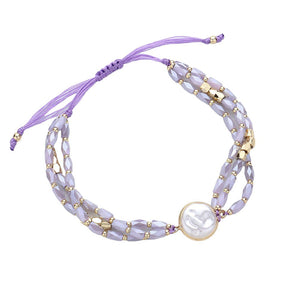 Lavender Pearl Pointed Faceted Beaded Pull Tie Cinch Bracelet, Indulge in luxury with our dazzling and elegant bracelet features beautifully crafted pearls and faceted beads, all perfectly strung together for a stunning piece that will elevate any outfit. With its adjustable pull tie cinch, you can achieve the perfect fit.