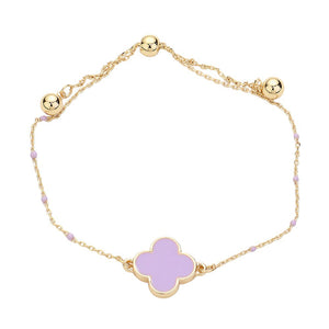Lavender Enhance your style with our Quatrefoil Pendant Accented Seed Beads Strand Pull Tie Cinch Bracelet. Crafted with intricate details, this bracelet is perfect for adding a touch of elegance to any outfit. The adjustable pull tie allows for a comfortable and secure fit. Step up your fashion game today.