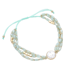 Mint Pearl Pointed Faceted Beaded Pull Tie Cinch Bracelet, Indulge in luxury with our dazzling and elegant bracelet features beautifully crafted pearls and faceted beads, all perfectly strung together for a stunning piece that will elevate any outfit. With its adjustable pull tie cinch, you can achieve the perfect fit.