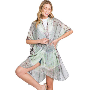 Olive Tie Dye Print Kimono Poncho, is the perfect addition to any wardrobe. Made of high-quality polyester fabric with a unique tie dye print, it is both stylish and comfortable. Its versatile design allows for a variety of styling options, making it a must-have for all fashion enthusiasts. Gift it yourself or to loved one.