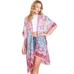 Pink Abstract Paisley Print Kimono Poncho, Expertly crafted with an abstract paisley print, this kimono poncho is a versatile addition to any wardrobe. Made with lightweight, breathable material, it's perfect for layering over any outfit for a chic look. Enjoy the unique design and comfortable fit of this statement piece.