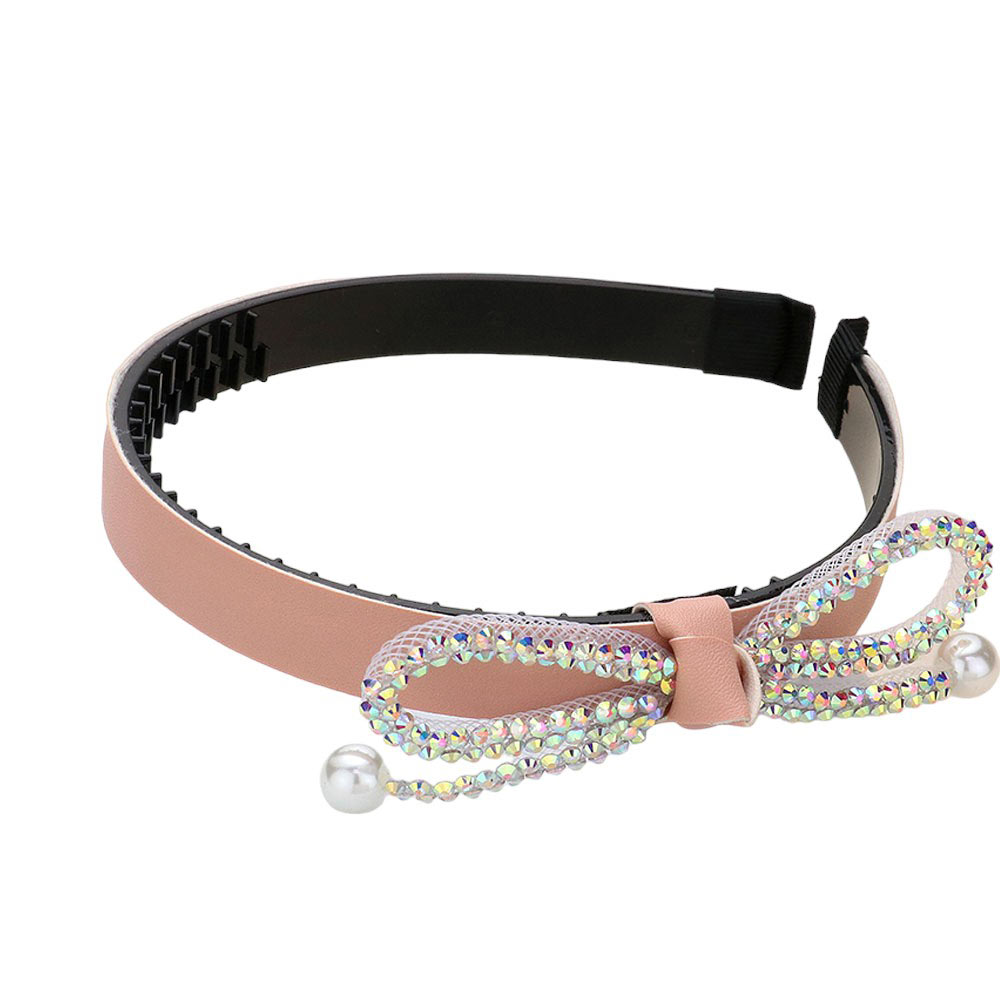 Pink Bling Studded Pearl Tip Bow Accented Headband, this is a luxurious and stylish accessory that adds a touch of elegance to any outfit. The studded pearls and bow design create a classic and sophisticated look, perfect for formal events or adding a touch of glamour to your everyday style.