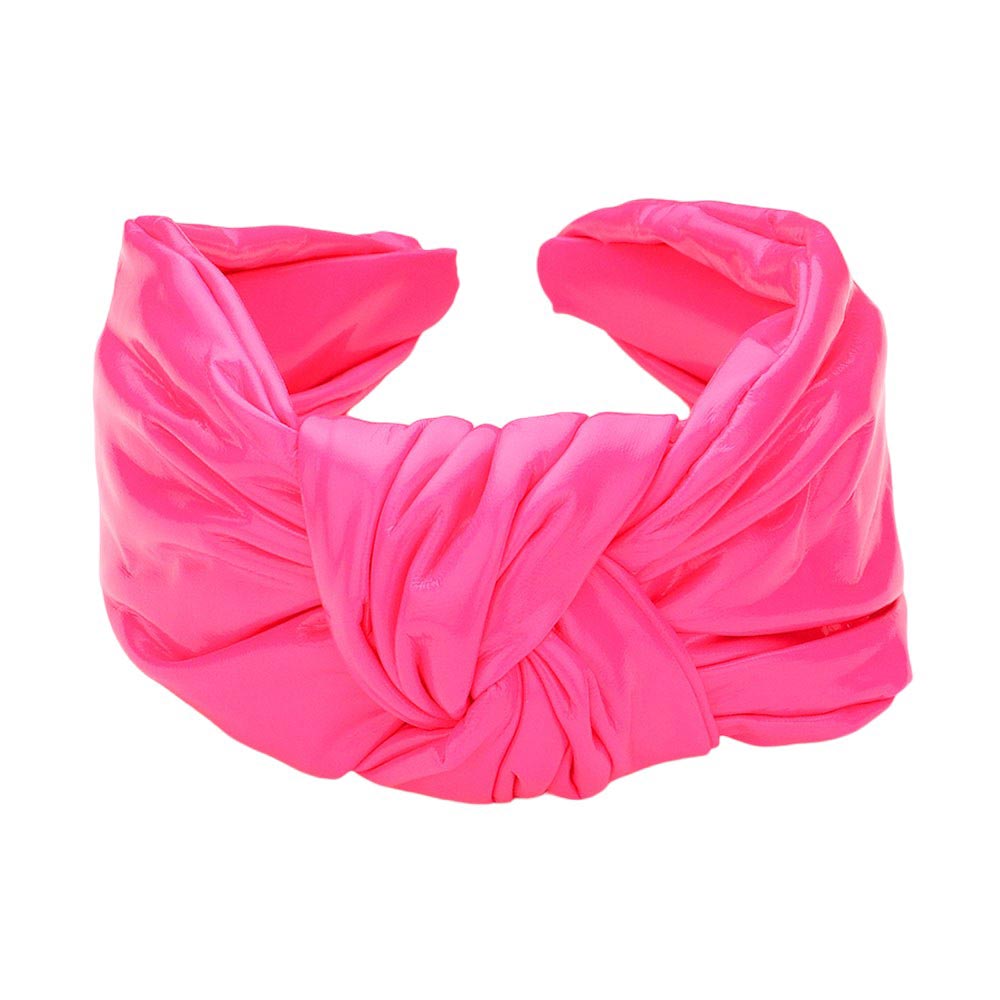 Pink Faux Shiny Leather Knot Headband, the perfect accessory for adding a touch of elegance to any outfit. Made from high-quality faux leather, this headband boasts a sleek and shiny finish. Its knot design adds a unique and stylish touch. This shiny headband is a perfect gift accessory for your loved ones.