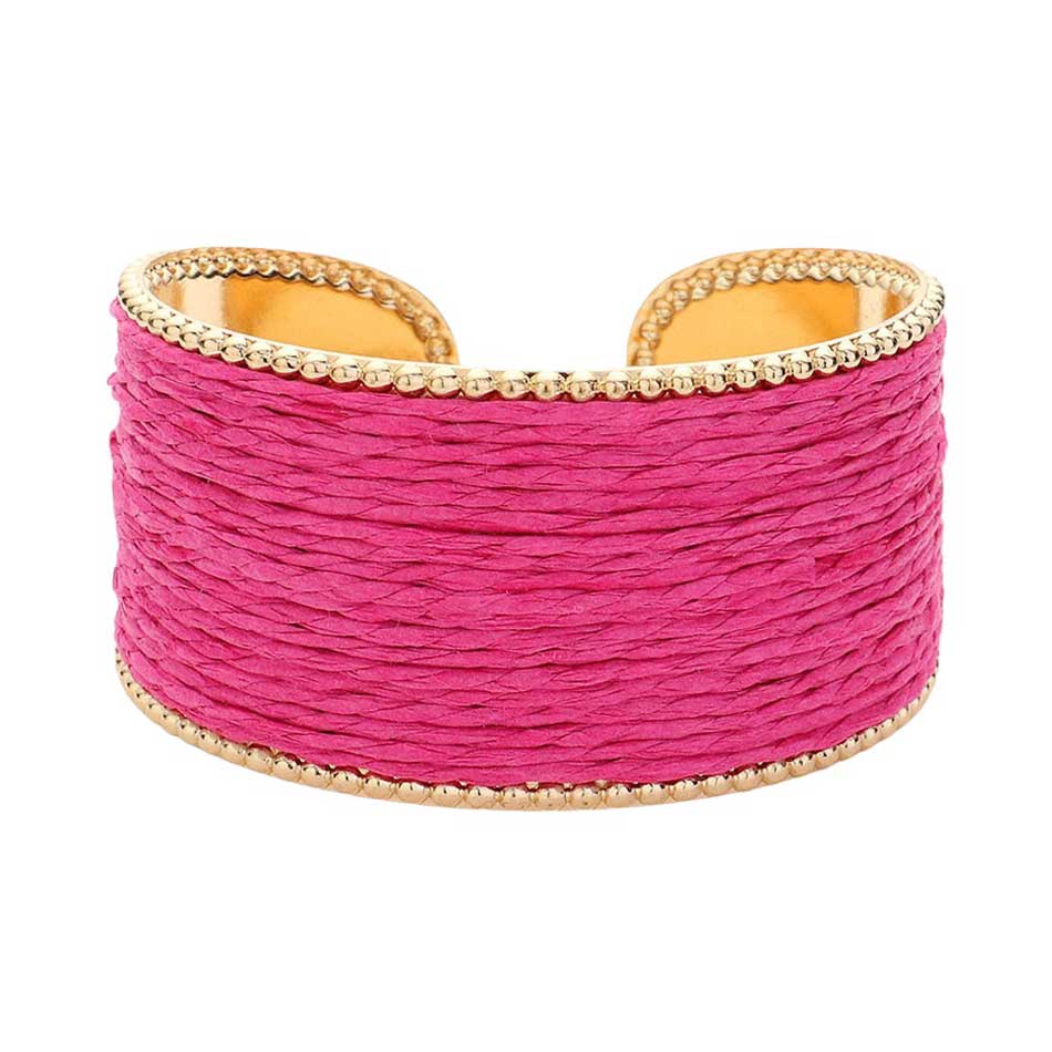 Pink Raffia Cuff Bracelet, Introducing a unique addition to your jewelry collection. Made from versatile raffia, this cuff offers a touch of natural elegance to any outfit. Its lightweight design ensures all-day comfort. Perfect for giving a lovely gift to someone you love and care about. Elevate your style with this.