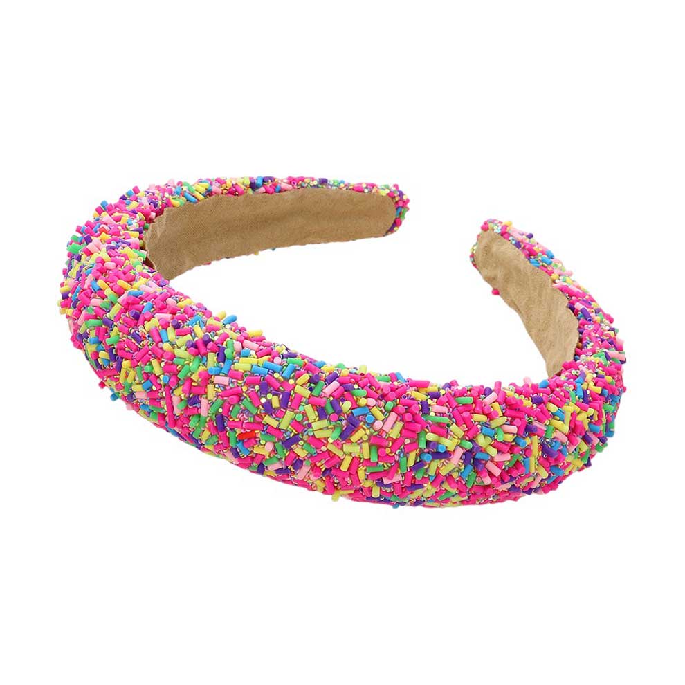 Pink Sprinkle Beaded Headband. Upgrade your hair accessory game with our headband with the perfect blend of style and functionality, this headband adds a touch of elegance to any outfit. Made with precision and quality materials, it will elevate your look and keep your hair in place all day long.