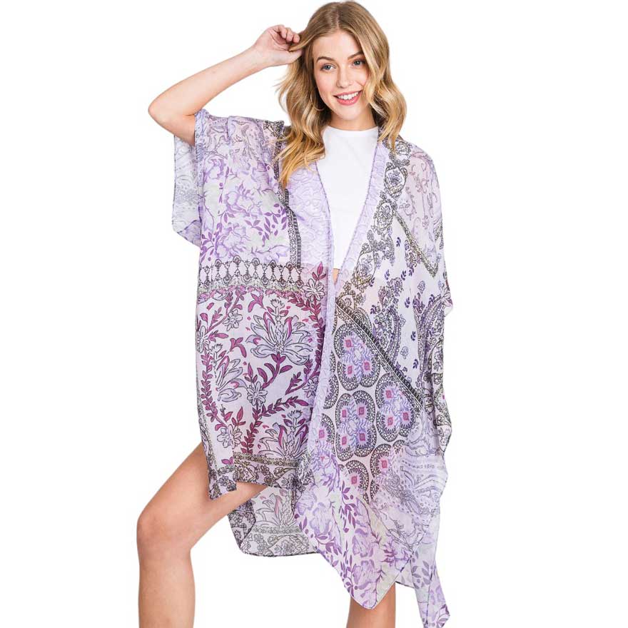 Purple Paisley Flower Print Kimono Poncho, Expertly crafted with a paisley print, this kimono poncho is a versatile addition to any wardrobe. Made with lightweight, breathable material, it's perfect for layering over any outfit for a chic look. Enjoy the unique design and comfortable fit of this piece.