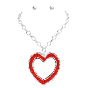 Red Rhodium Over Sized Stone Paved Open Heart Pendant Chunky Jewelry Set, This chunky set features an oversized stone-paved open heart pendant, adding a unique touch to any outfit. The chunky chain is both stylish and comfortable to wear, making this necklace a must-have for any fashion-forward individual. Elevate your look.