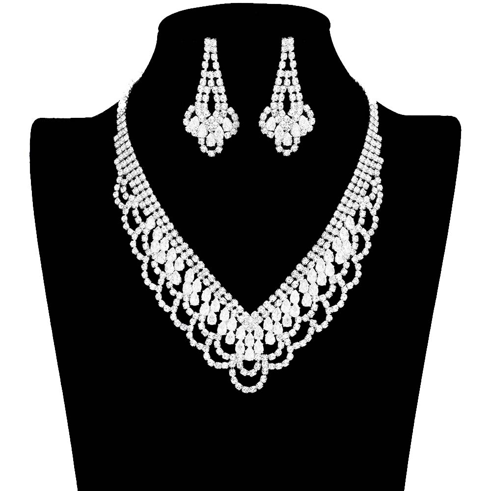 Silver CZ Teardrop Stone Detailed Jewelry Set. Adorn yourself in elegance and luxury with this. Accented with shimmering cubic zirconia, this statement-making jewelry set is sure to bring a touch of glamour to any ensemble. Crafted with meticulous attention to detail, this set is perfect for any special occasion or as a gift.