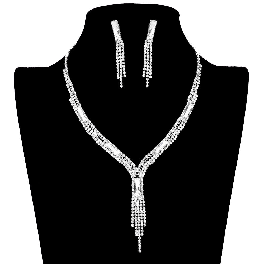 Silver Rectangle Stone Accented Rhinestone Fringe Tip Jewelry Set, perfect for adding a touch of elegance to any special occasion outfit. Featuring a beautiful rectangle stone accent, this necklace and earring set will be a unique addition to any jewelry collection. Perfect gift choice for loved ones on any special day.