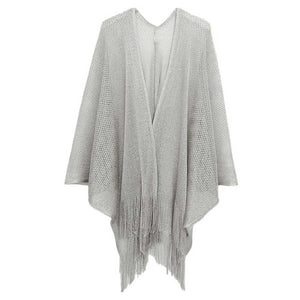Silver Sparkle Glitter Mesh Kimono Poncho, is a must-have for fashion-forward women. Crafted with sparkling glitter mesh fabric, it adds a chic and stylish flair to any look. Its lightweight and breathable design also promises all-day comfort. Ideal gift choice for fashion-loving friends and family members.