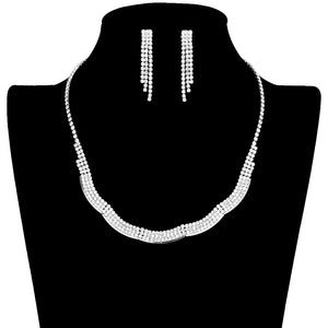Silver Wavy Rhinestone Jewelry Set, features delicate rhinestones arranged in an elegant ribbon-like pattern, creating an eye-catching look. The light-catching stones add sparkle and shine to any ensemble and the wave adds an extra layer of beauty. Perfect for special occasions, this stylish set is sure to make a statement.