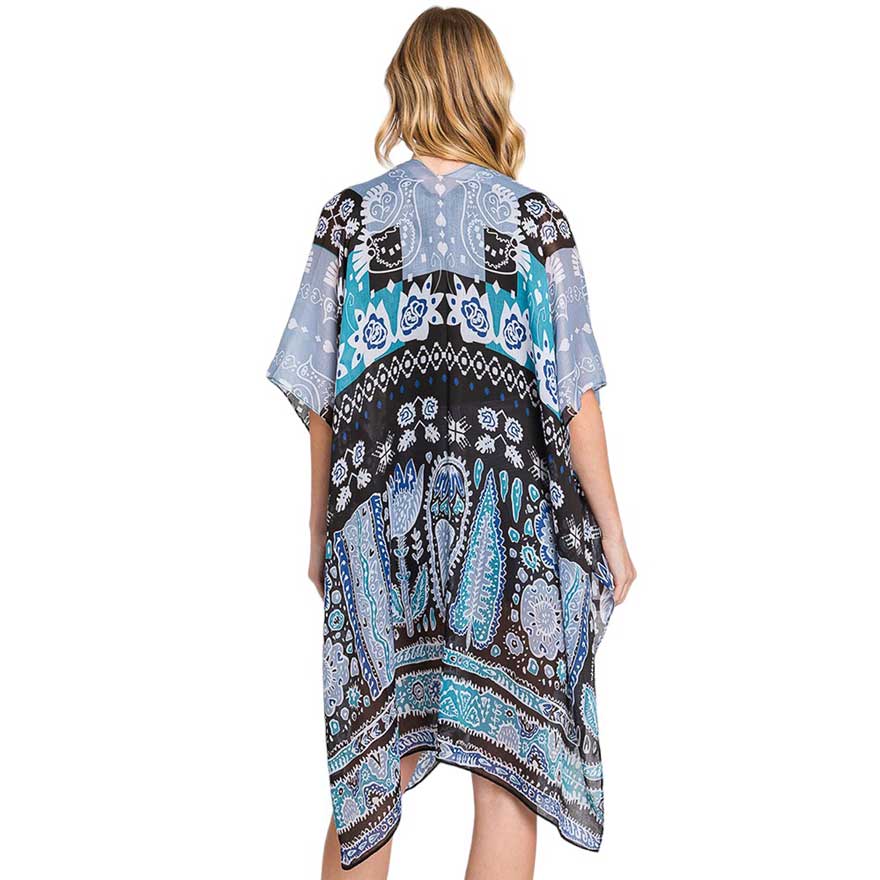 Teal Geometric Boho Print Kimono Poncho, Expertly crafted with a stylish print, this is the perfect addition to any outfit. Offering versatile and effortless style, it can easily be dressed up or down for any occasion. It's both comfortable and fashionable, making it a must-have in anyone's wardrobe.