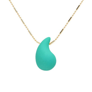 Teal stunning Matte Colored Teardrop Pendant Necklace is a must-have for any fashion-forward individual. Its matte finish adds a touch of sophistication, while the teardrop shape provides a delicate and feminine touch. Elevate any outfit with this stylish and versatile piece.