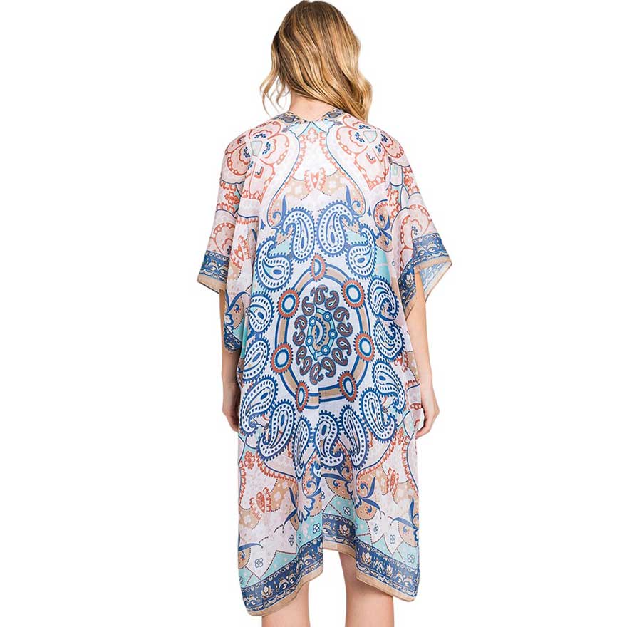 Turquoise Abstract Paisley Print Kimono Poncho, Expertly crafted with an abstract paisley print, this kimono poncho is a versatile addition to any wardrobe. Made with lightweight, breathable material, it's perfect for layering over any outfit for a chic look. Enjoy the unique design and comfortable fit of this statement piece.