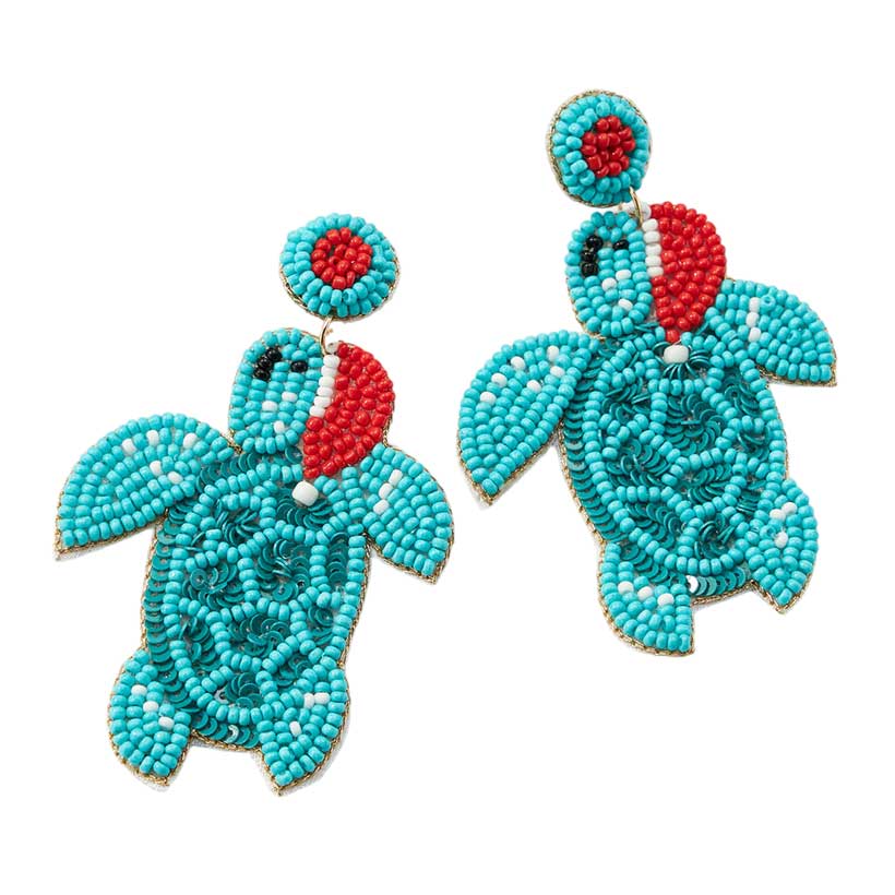 Turquoise Felt Back Seed Beaded Santa Hat Turtle Dangle Earrings, are fun handcrafted jewelry that fits your lifestyle. Highlight your appearance, and grasp everyone's eye at your party. Enhance your attire with these vibrant artisanal earrings to show off your style. Great gift idea for your Wife, Mom, your Loving one.