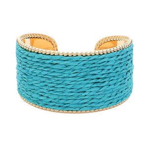 Turquoise Raffia Cuff Bracelet, Introducing a unique addition to your jewelry collection. Made from versatile raffia, this cuff offers a touch of natural elegance to any outfit. Its lightweight design ensures all-day comfort. Perfect for giving a lovely gift to someone you love and care about. Elevate your style with this.