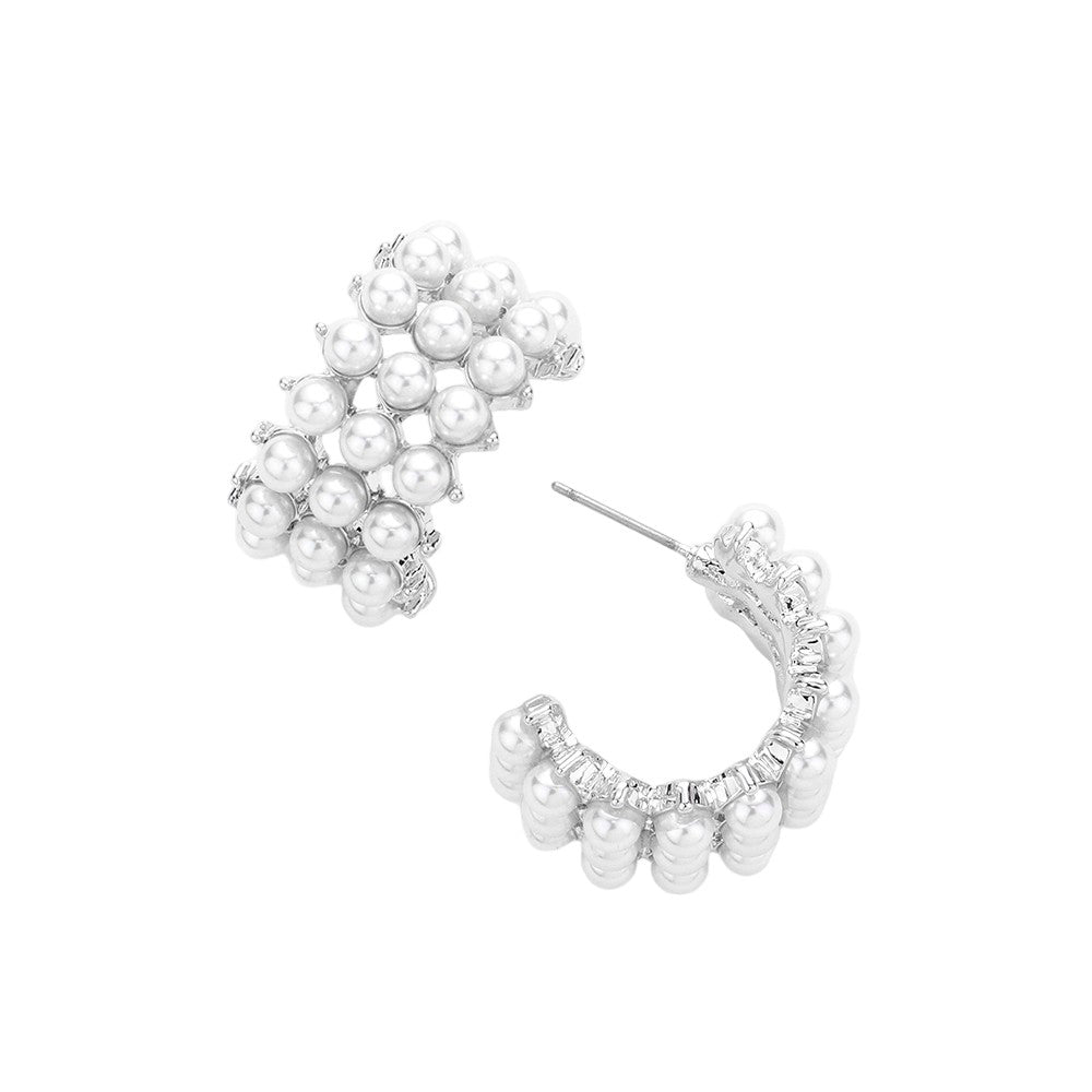 Cream Pearl Cluster Hoop Earrings, Embrace elegance with these. These stunning earrings feature a delicate cluster of lustrous pearls, adding a touch of sophistication to any outfit. Elevate your style with these luxurious earrings and make a statement wherever you go.