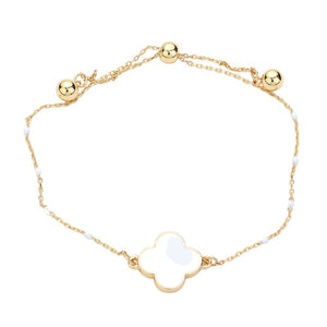 White Enhance your style with our Quatrefoil Pendant Accented Seed Beads Strand Pull Tie Cinch Bracelet. Crafted with intricate details, this bracelet is perfect for adding a touch of elegance to any outfit. The adjustable pull tie allows for a comfortable and secure fit. Step up your fashion game today.