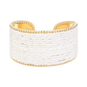 White Raffia Cuff Bracelet, Introducing a unique addition to your jewelry collection. Made from versatile raffia, this cuff offers a touch of natural elegance to any outfit. Its lightweight design ensures all-day comfort. Perfect for giving a lovely gift to someone you love and care about. Elevate your style with this.
