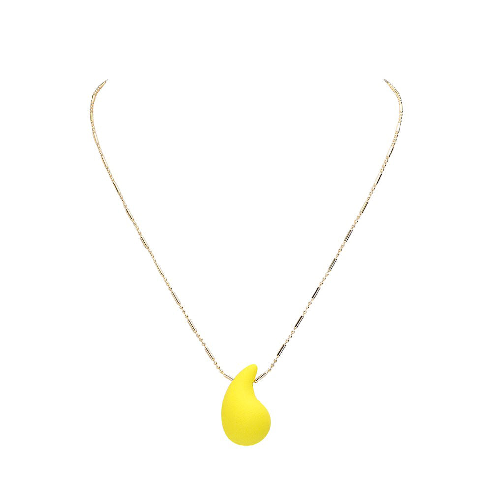Yellow stunning Matte Colored Teardrop Pendant Necklace is a must-have for any fashion-forward individual. Its matte finish adds a touch of sophistication, while the teardrop shape provides a delicate and feminine touch. Elevate any outfit with this stylish and versatile piece.