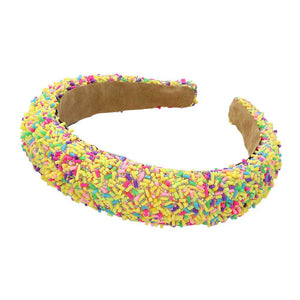 Yellow Sprinkle Beaded Headband. Upgrade your hair accessory game with our headband with the perfect blend of style and functionality, this headband adds a touch of elegance to any outfit. Made with precision and quality materials, it will elevate your look and keep your hair in place all day long.