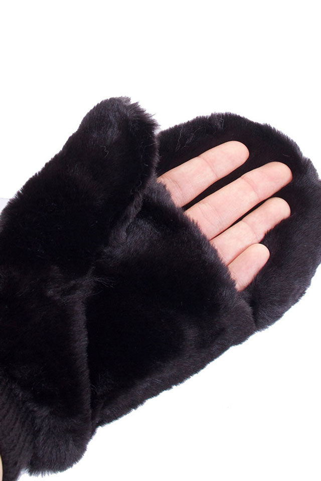 Black CC Faux Fur Mittens With Shepherd Lining, are a smart, eye-catching, and attractive addition to your outfit. These trendy gloves keep you absolutely warm and toasty in the winter and cold weather outside. Accessorize the fun way with these gloves. It's the autumnal touch you need to finish your outfit in style. A pair of these gloves will be a nice gift for your family, friends, anyone you love, and even yourself.