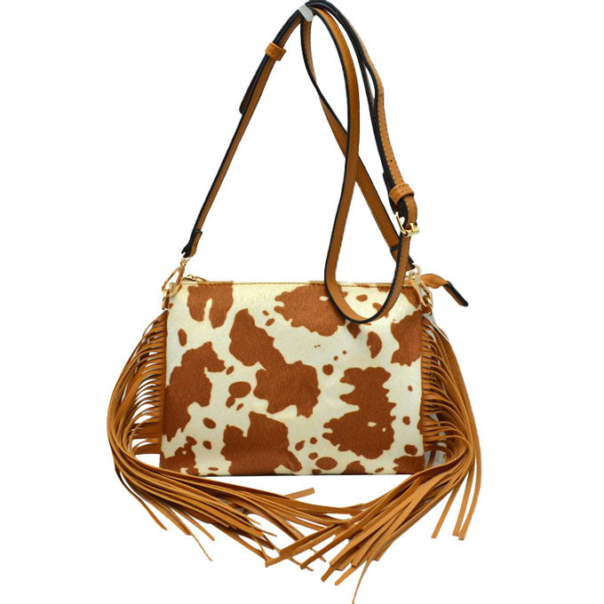 Multi 1 Trendy Cowprint Tassel Fringe Crossbody purse womens Handbag, This Cowprint handbag can be worn crossbody or on the shoulder. These comfortable handbag is made of high quality durable leather.This handbag features one big compartments, for your essentials and a little more. Show your trendy side with this awesome crossbody bag. Have fun and look stylish with its fringe details.