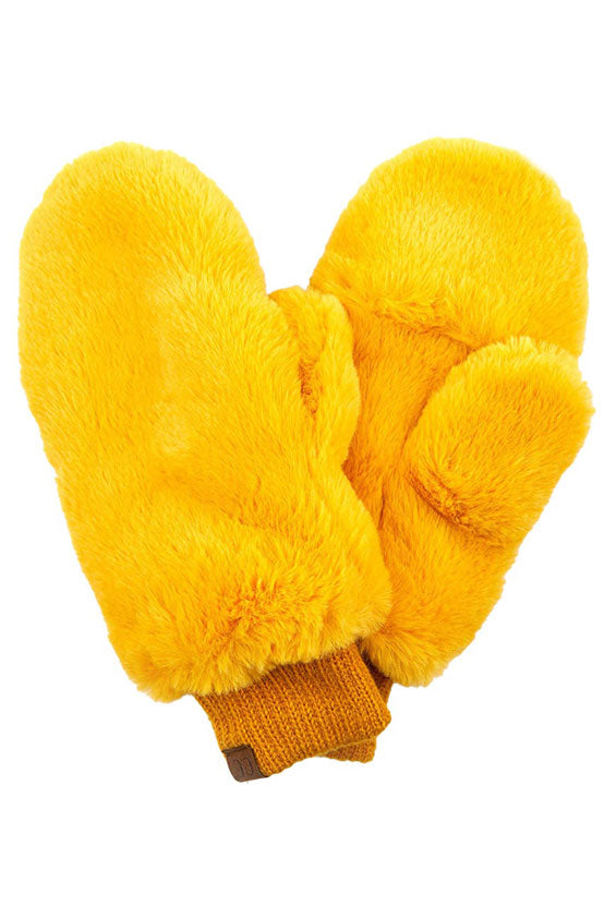Mustard CC Faux Fur Mittens With Shepherd Lining, are a smart, eye-catching, and attractive addition to your outfit. These trendy gloves keep you absolutely warm and toasty in the winter and cold weather outside. Accessorize the fun way with these gloves. It's the autumnal touch you need to finish your outfit in style. A pair of these gloves will be a nice gift for your family, friends, anyone you love, and even yourself.