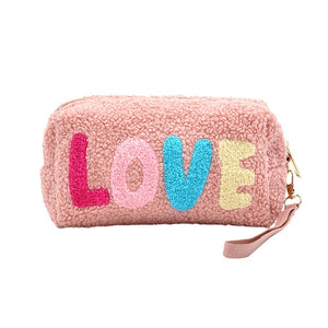 Pink Faux Fur Love Message Pouch With Wristlet, this excellent and LOVE message-containing wristlet goes with any outfit and shows your trendy choice to make you stand out. perfect for carrying makeup, money, credit cards, keys or coins, etc. Comes with a wristlet for easy carrying. It's perfectly lightweight and simple. Put it in your bag and find it quickly with its eye-catchy colors. Great for running small errands while keeping your hands fr