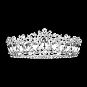 Silver Teardrop Stone Accented Crown Tiara, Add a magical touch to any women on her big day by wearing this sparkling tiara. She will be instantly transformed into a fairytale princess. A stunning teardrop stone tiara that can be a perfect bridal headpiece. Makes you more eye-catching in the crowd. This hair accessory is really beautiful, pretty, and lightweight. Show your royalty with this teardrop princess tiara.