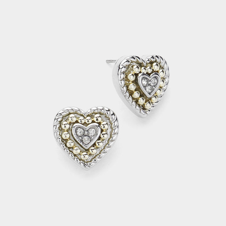 14K Gold Plated Stone Paved Two Tone Heart Stud Earrings will add a touch of elegance to any outfit. The intricate stone paving and two-tone design make them a unique and luxurious choice. Made with high-quality materials, they are durable and will make the perfect addition to your jewelry collection. 