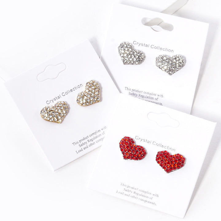 3-Colors-Crystal Pave Heart Stud Earrings are expertly crafted with sparkling crystals, adding a touch of elegance to any outfit. Made with precision and attention to detail, they are perfect for special occasions or everyday wear. Upgrade your style with these stunning earrings.